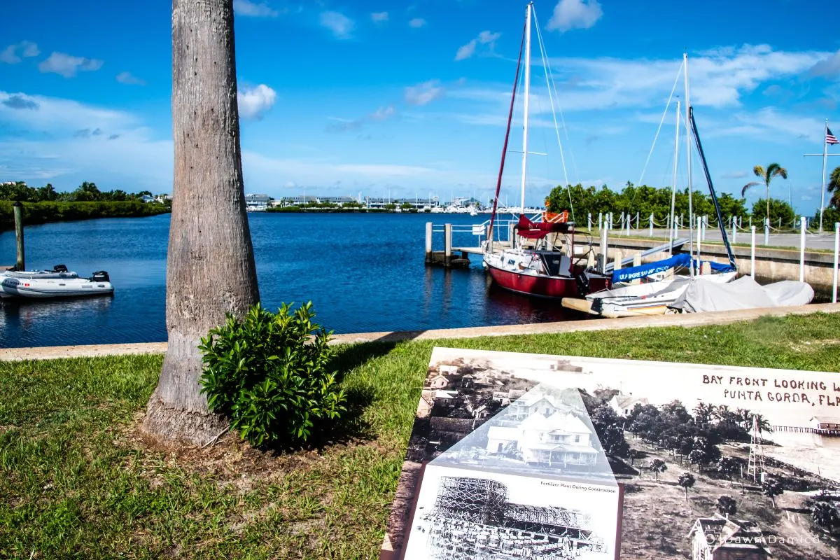 Punta Gorda FL-Bay Front Historical Marker view of fisherman's village from the river walk,punta gorda, fl